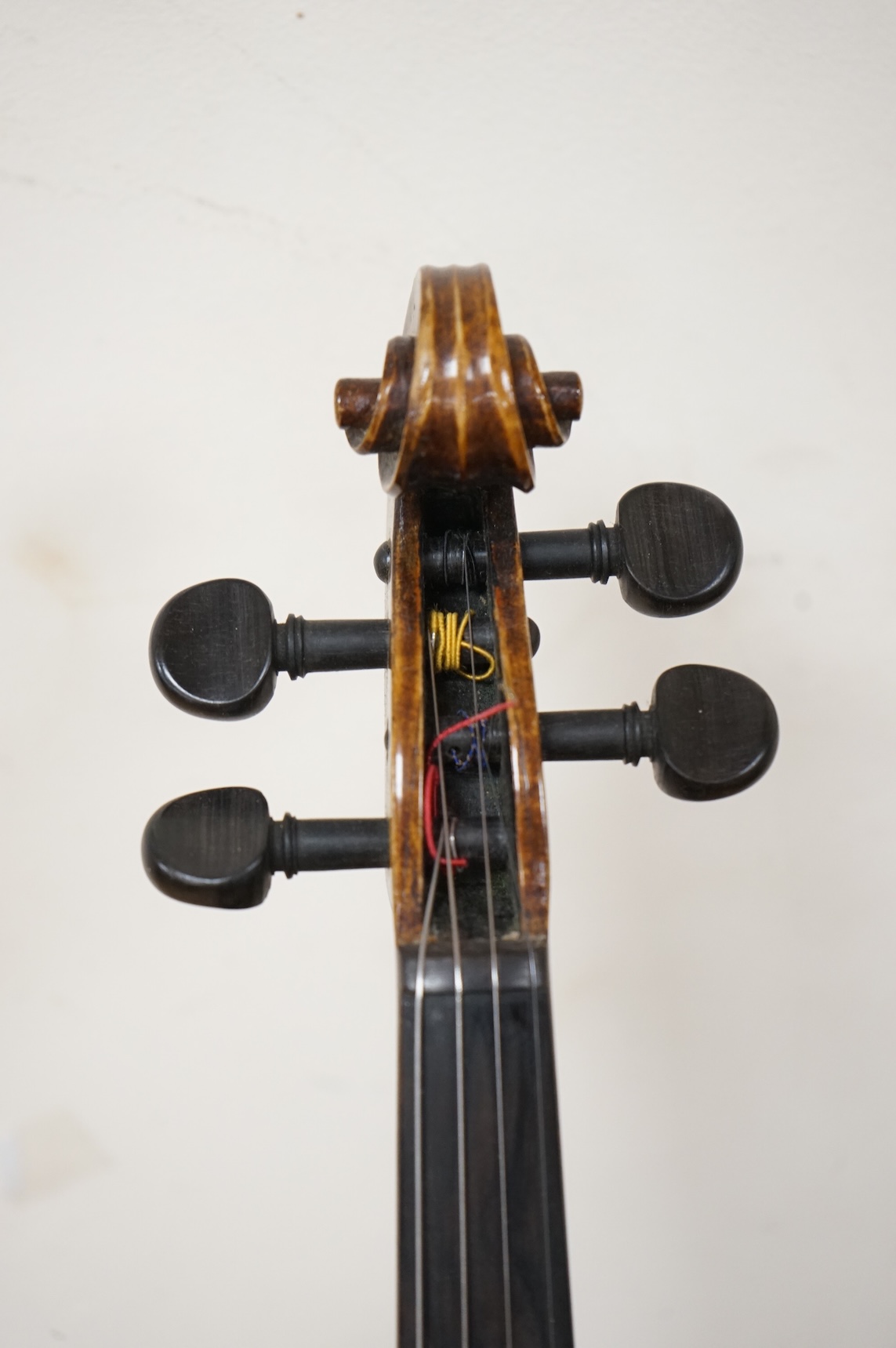 A late 19th century violin, with label for J.B. Schweitzer, 7/8 size, no bow, in case